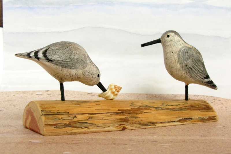 Carved Wood Sandpipers Feeding